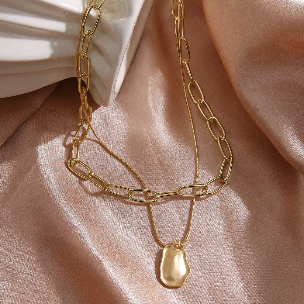 Layered golden stone chain necklace